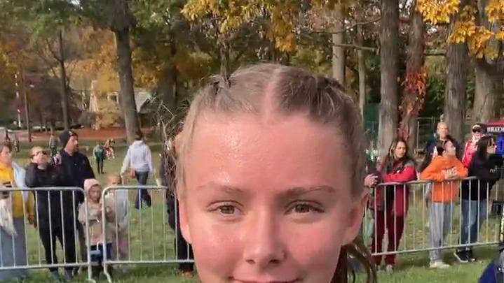 Woodridge's Lola Mullen reacts to taking second at Boardman regional