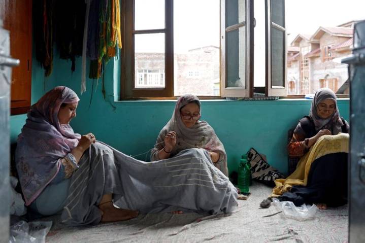Hobbled by US tariffs, carpet weavers in India’s Kashmir struggle to stay afloat