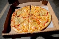 Parent company of major pizza chain buys 64 restaurants to prevent closings