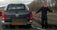 Shock moment road rage thug stops on motorway fast lane to taunt another driver