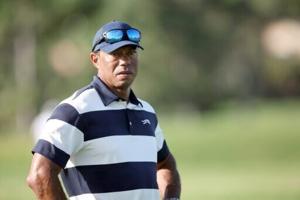 Woods undergoes lower back disc replacement surgery
