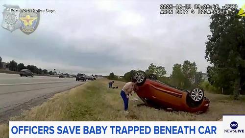 Baby pulled from overturned vehicle in dramatic rescue