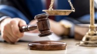 Dover man convicted of firing gun at high school football game
