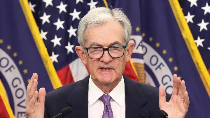 Fed cuts rates; Powell says December move ‘far from’ certain
