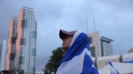 Guerra en Oriente Próximo, en directo | Tel Aviv se despierta expectante ante la liberación de los rehenes en Gaza