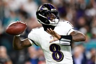 Lamar Jackson has 4 TD passes in return as Ravens rout Dolphins