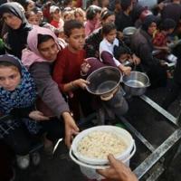 Turkish experts to help find bodies in Gaza, as Trump warns Hamas