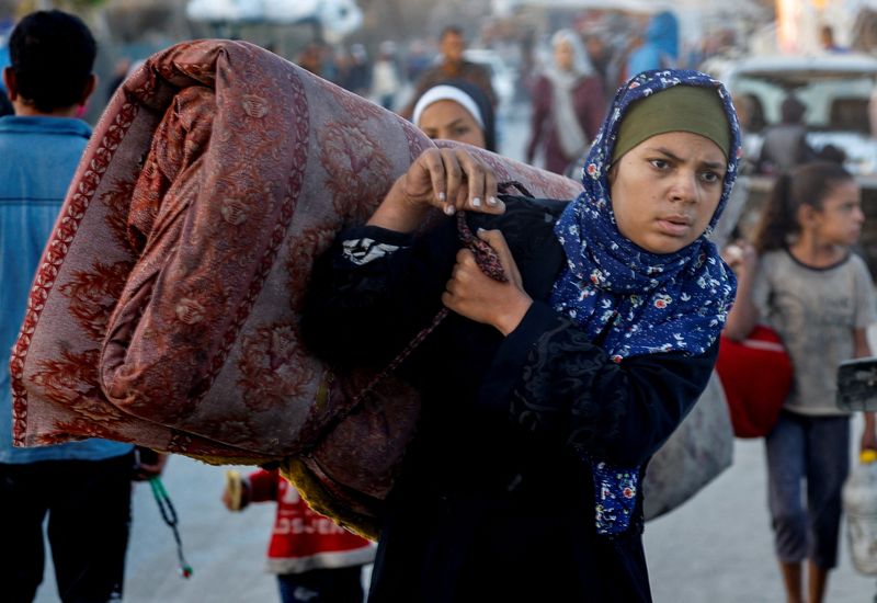 Gazans trek to ruined homes as Israeli forces pull back under ceasefire