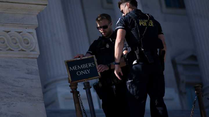 As they go unpaid, Capitol Police are a daily reminder for lawmakers of shutdown pain
