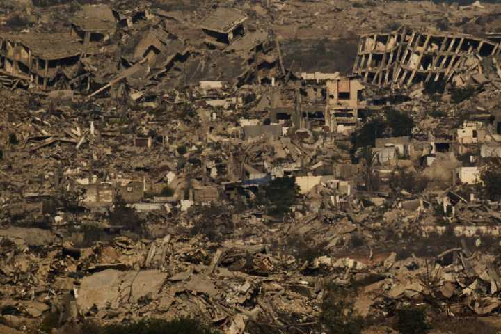 Hamas reaffirms commitment to ceasefire as delays in returning hostages' bodies fray nerves