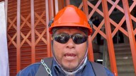 Puno: Trabajadores de construcción civil se encadenan en Gobierno Regional