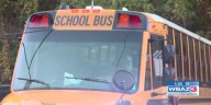 Safety officials warn drivers about the dangers of passing school buses