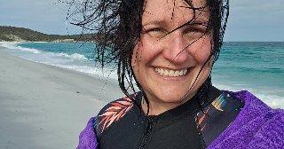 Youth mentor swims Tassie's cold waters for cause