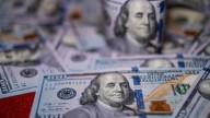 Dollar claws back losses from U.S. government shutdown, turns higher
