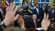 Trump seeks $230M from DOJ, vows to donate