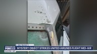 Mystery object hits United flight mid