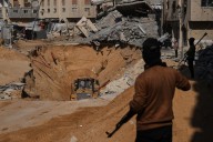 Israel strikes Gaza in first major test of ceasefire