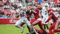 Late pick-6 helps lift Auburn to first SEC win over Arkansas 33