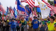 Large crowds rally against Trump at ‘No Kings’ protests across the US