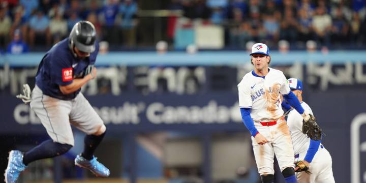 Josh Naylor hit by throw, called for interference double play