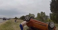 Video shows dramatic rescue of baby pinned by car in US