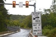 New Route 611 signs warn drivers not to blow through red traffic signals and cause dangerous head