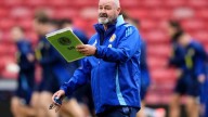 Katy Perry goes unnoticed by Scotland’s soccer coach as his team shares a hotel with pop star