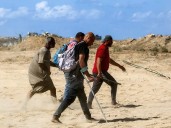 Israel ceases fire and Gazans begin trek home