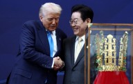 Trump gets huge gold crown in South Korea as host hails his 'golden age'