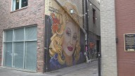 Vandals target Dolly Parton mural in Knoxville again