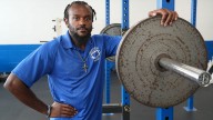 Former student leads players inside Brandywine High School's weight room