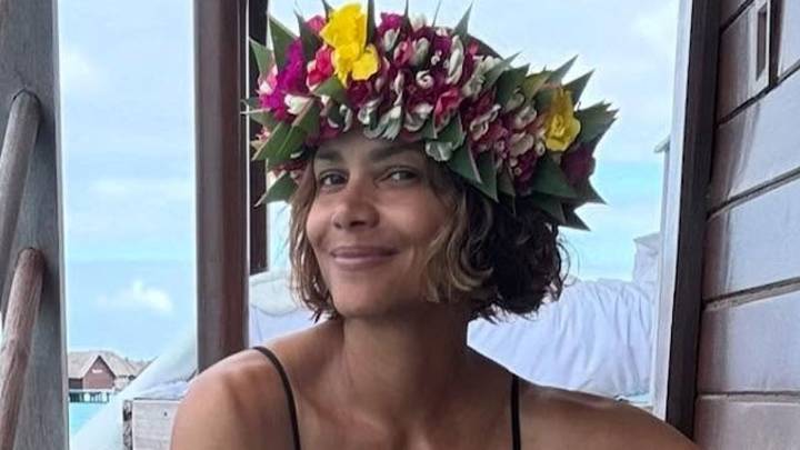 Halle Berry exposes her bare chest in see-through dress in stunning waterside photos