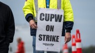 Canada Post denies Ottawa's reforms give it leverage over striking union in negotiations