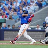 Guerrero grand slam fuels Blue Jays in 13