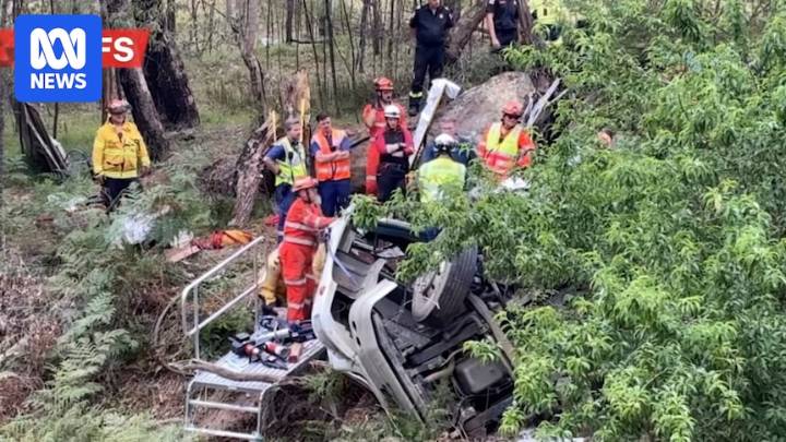 Man trapped in truck rollover which spilt 20,000 litres of rancid fish product into Putty Road creek bed