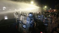 Georgia’s police use water cannons on protesters trying to storm presidential palace