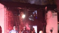 Several children, adults injured after jumping from windows of apartment fire on Indy's west side