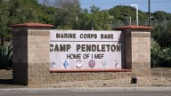Shrapnel from Marines anniversary demonstration detonates over California interstate and hits squad car, highway patrol says