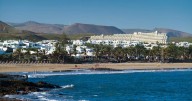 Brit, 56, dies and another critical after falling 20ft when 'hotel railing gives way'
