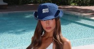Maura Higgins strips to skimpy bikini by the pool in jaw