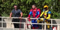 Local police dress up as super heroes to surprise kids at hospital