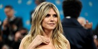 Heidi Klum, 52, Attends Paris Fashion Week, Causing a Stir with Her Teeth at VETEMENTS' Show