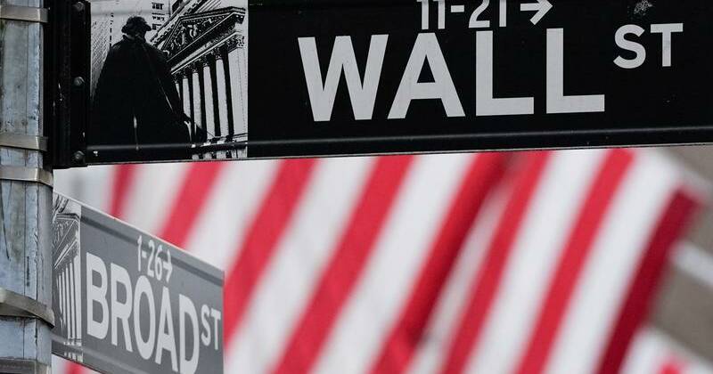 Wall St notches record closing highs on cool inflation