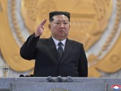 Kim Jong Un unveils North Korea’s ‘strongest nuclear weapon’ at parade
