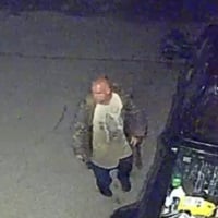 Police search for suspect accused of stealing license tag