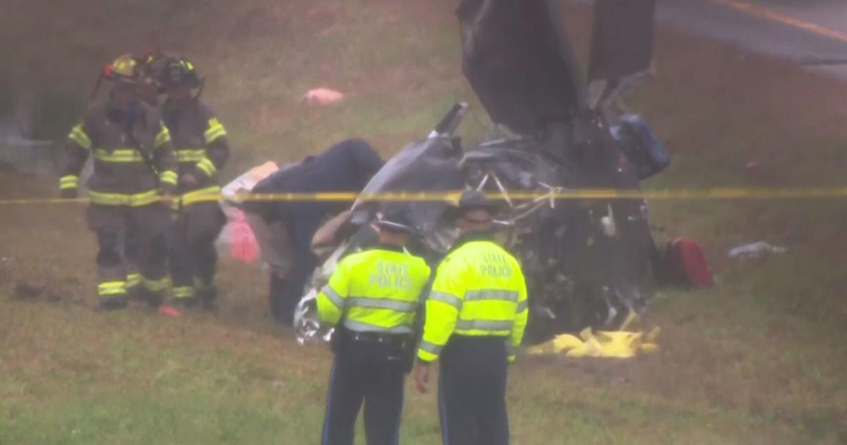 Plane crashes onto a Massachusetts highway, killing 2 and wounding 1 on the ground