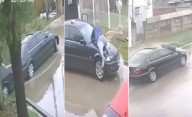 VIDEO. Un BMW chocó a un auto estacionado en Berisso y arrastró arriba del capot al dueño