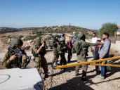 ‘Armed, dangerous’: Israeli settlers attack Palestinians harvesting olives