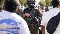 Woman shot by Border Patrol is charged; Brighton Park residents say feds antagonized the community