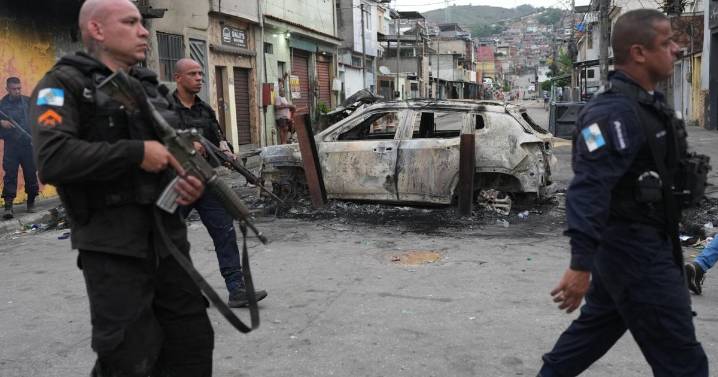 Photos show massive police raid in Rio's favelas leaving dozens dead in clashes with drug gangs